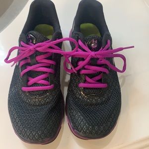 Under armor tennis shoes.